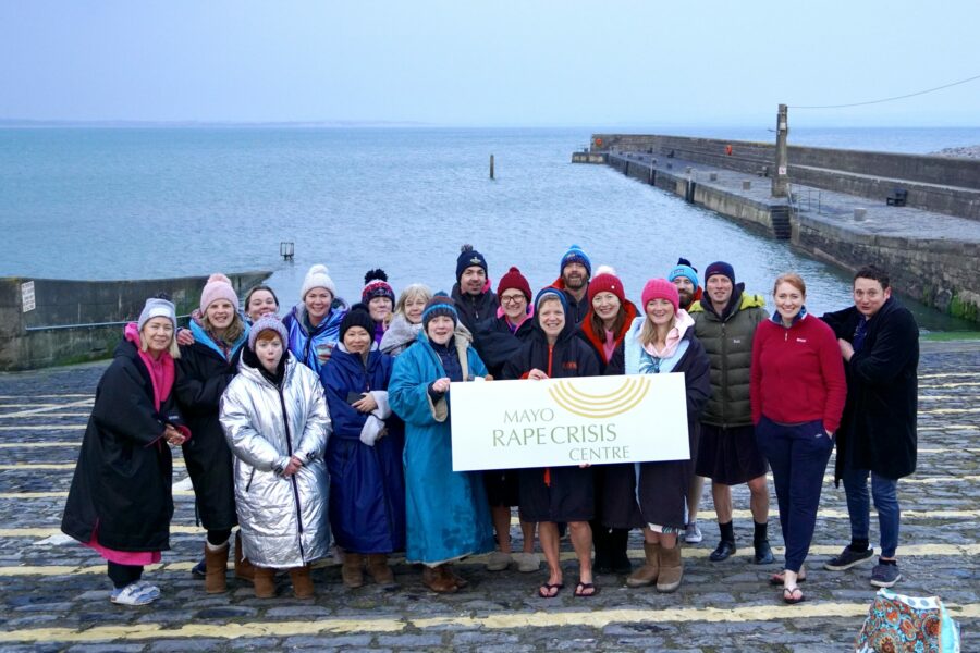 A group pictured participating in a sunrise dip on International Women's Day 2022 in support of Mayo Rape Crisis Centre.